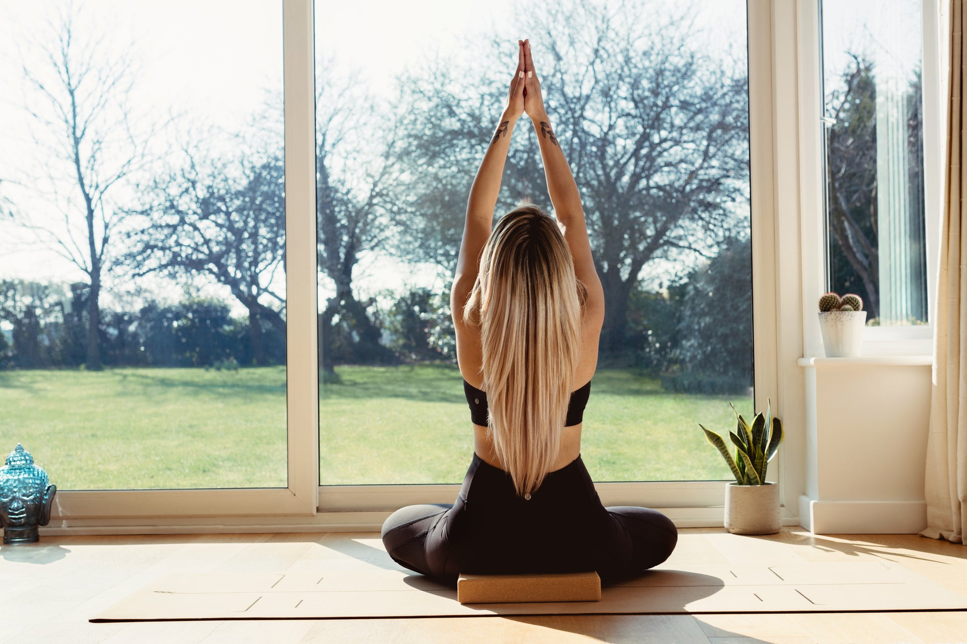 natural cork yoga block standing upright – non-slip yoga accessory from YogaHaus London